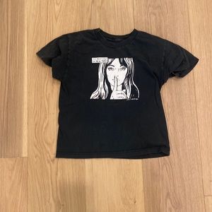 This t shirt is from brandy Melville. It is one of there older shirts.